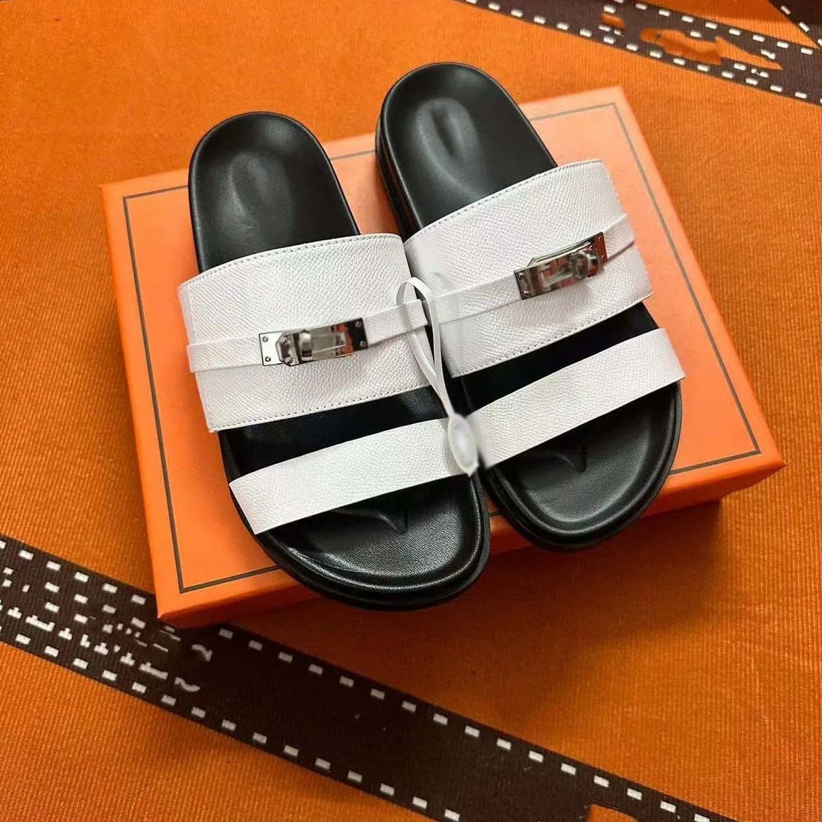Hermès Sandals Two-strap flat with Kelly buckle — White palm print