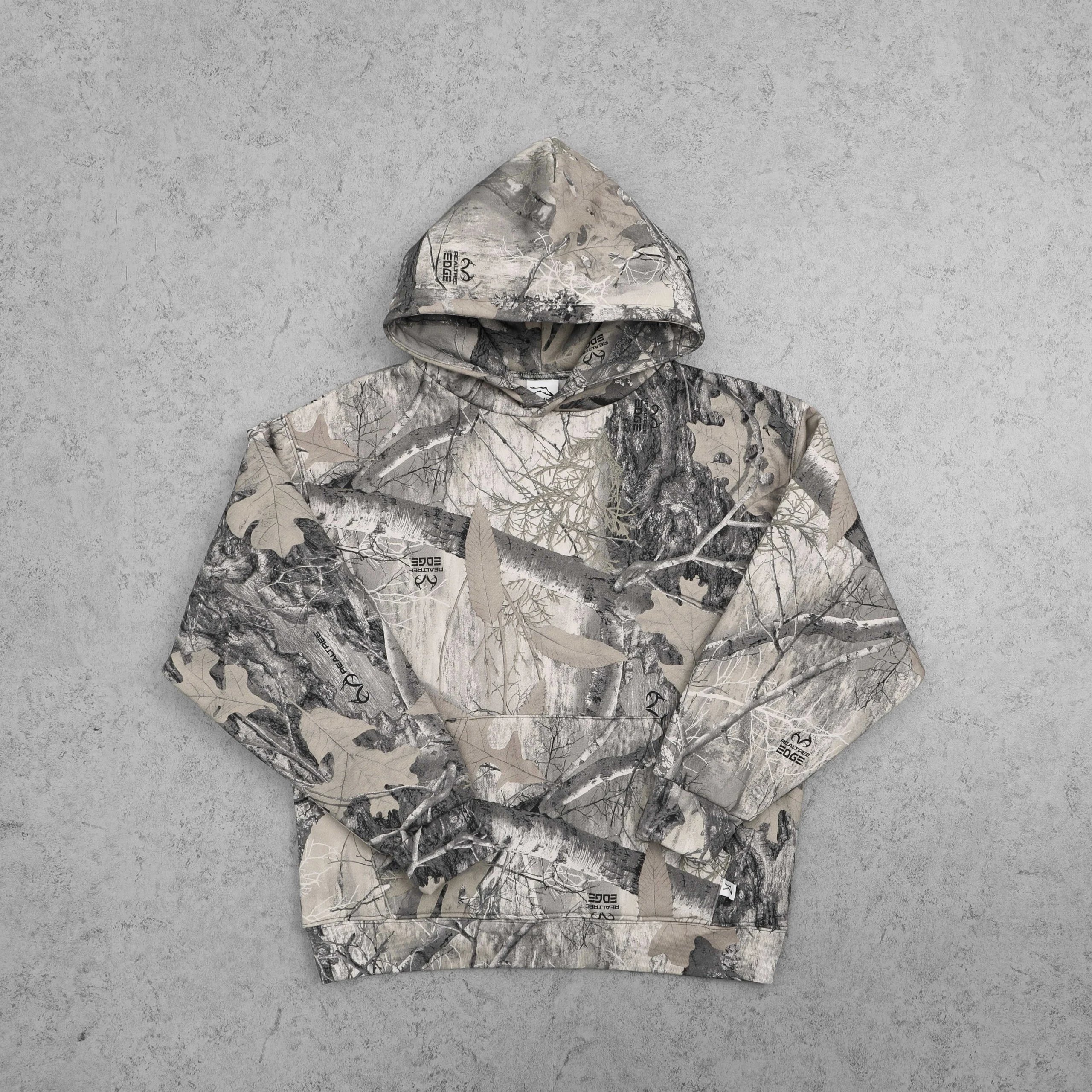 Realtree Camouflage print hooded sweatshirt with leaf and birch bark pattern, long sleeves, drawstring hood