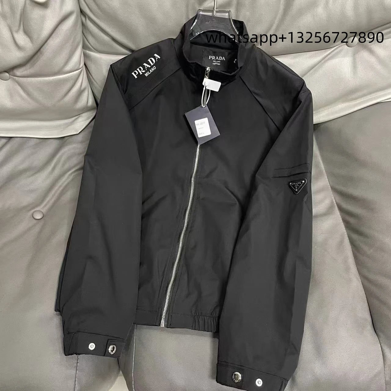 Unbranded Jackets Hooded zip-up jacket with monogram print and contrast sleeve tape — Prada7