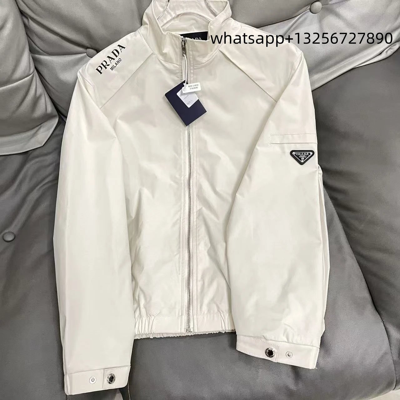 Unbranded Jackets Hooded zip-up jacket with monogram print and contrast sleeve tape — Prada8