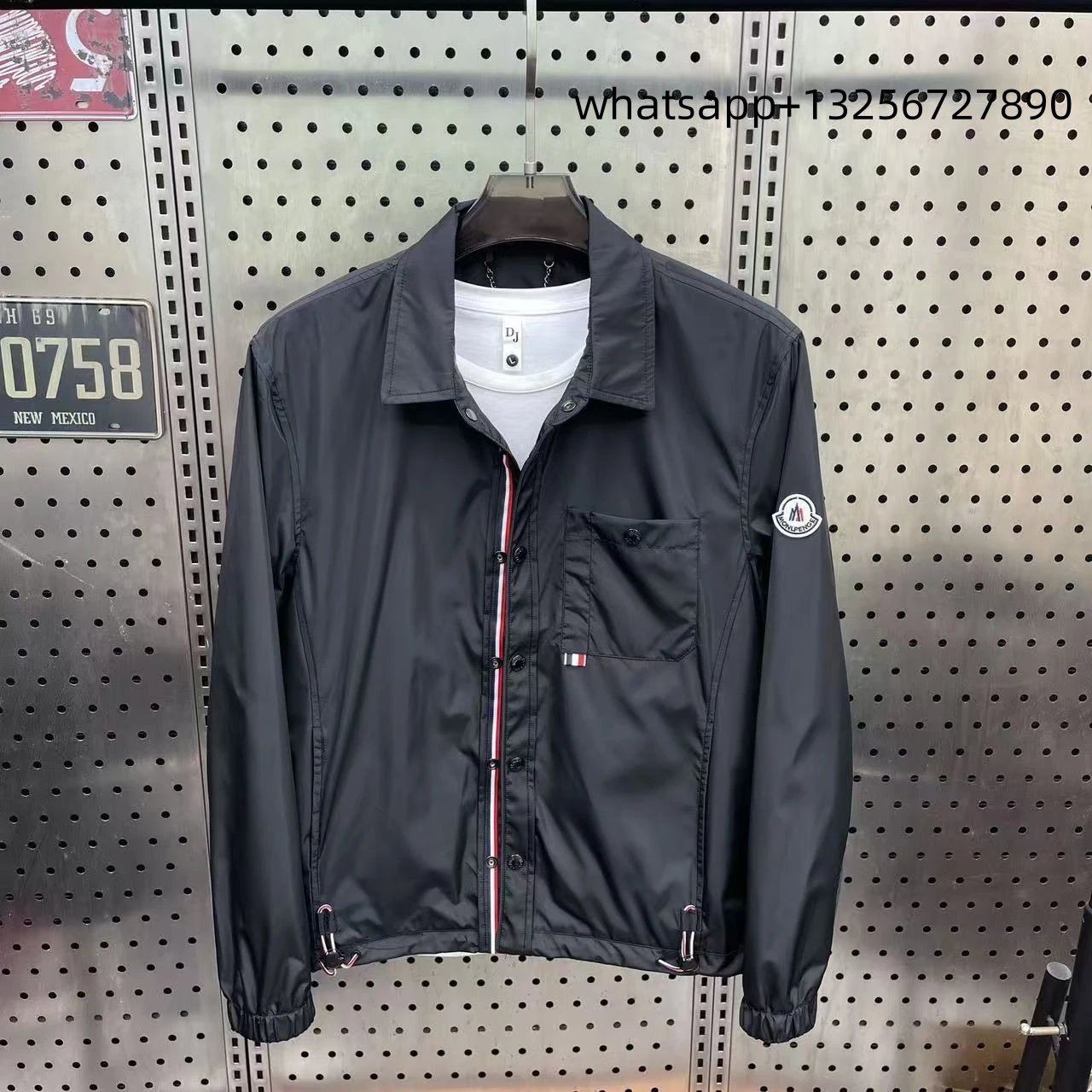 Unbranded Jackets Hooded zip-up jacket with monogram print and contrast sleeve tape — Moncler22