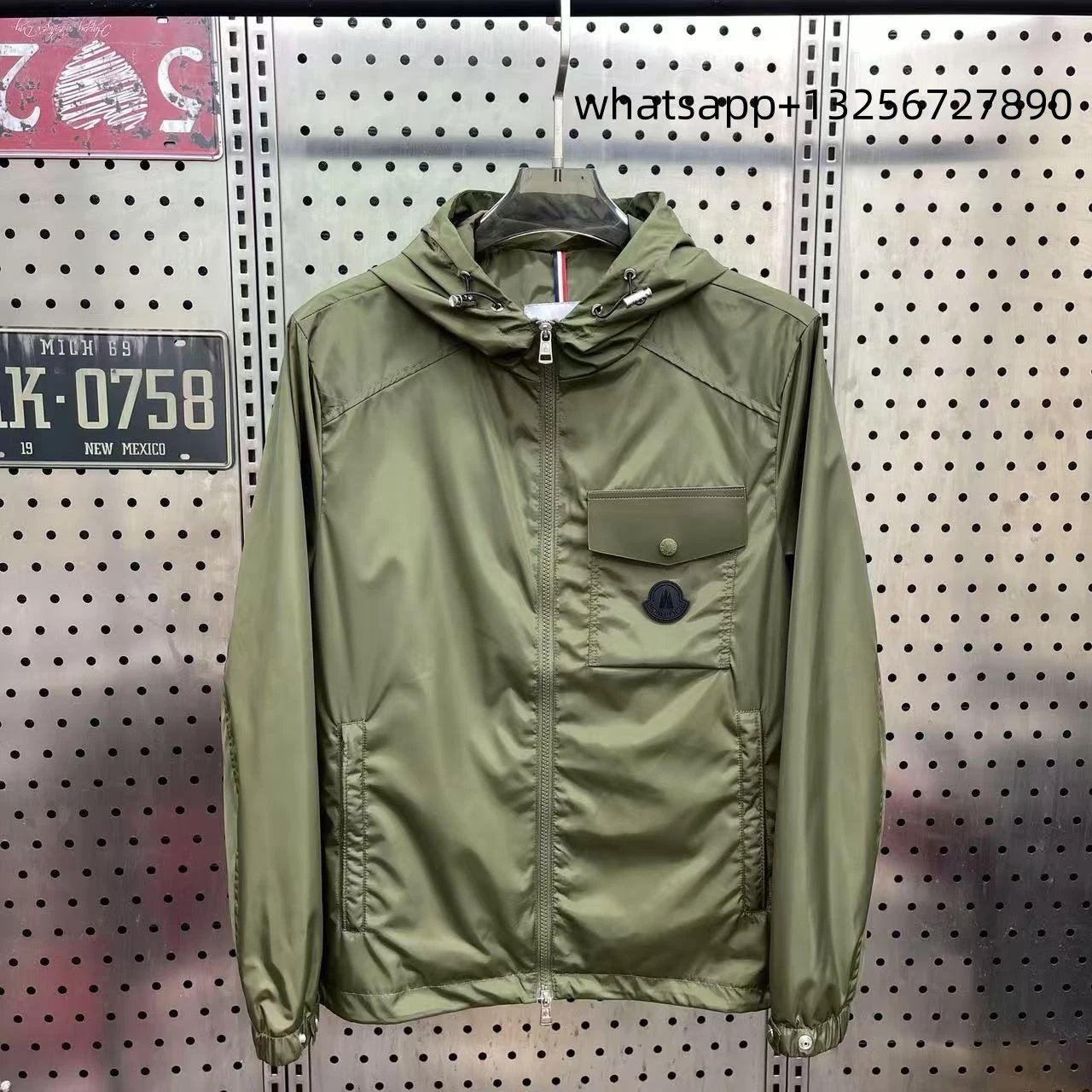 Unbranded Jackets Hooded zip-up jacket with monogram print and contrast sleeve tape — Moncler18