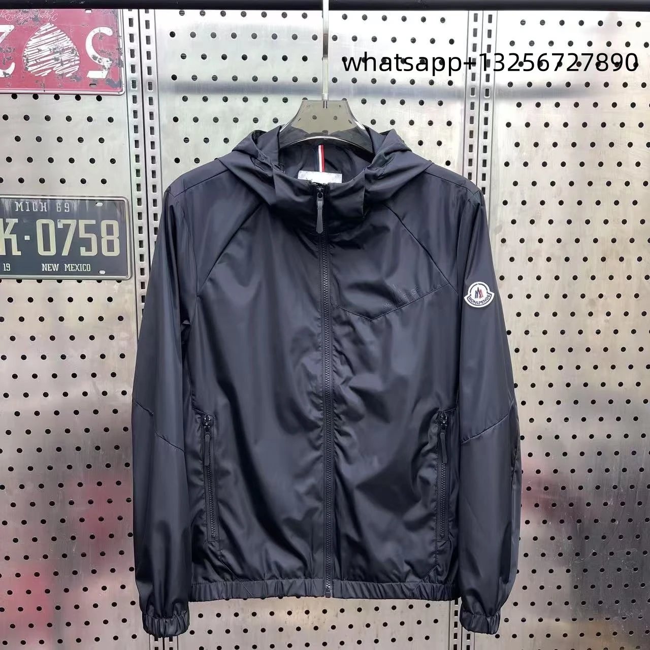 Unbranded Jackets Hooded zip-up jacket with monogram print and contrast sleeve tape — Moncler17