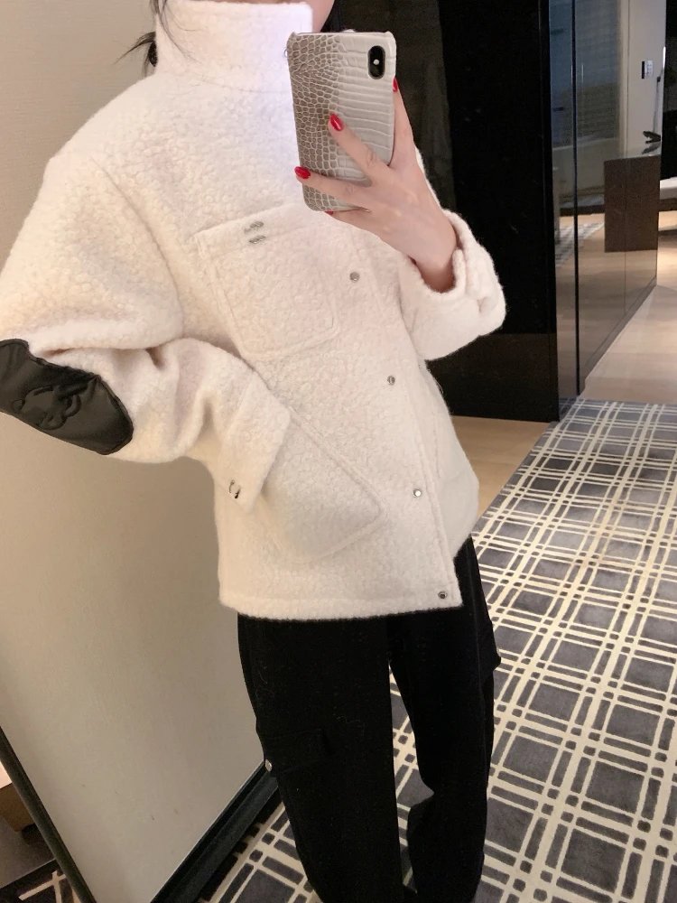 Chanel Jackets Bouclé stand-collar jacket with patch pockets and quilted elbow patches image 2