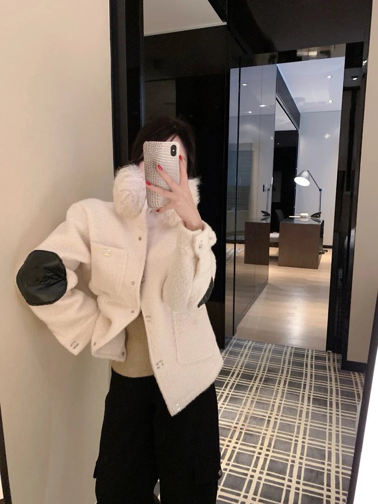 Chanel Jackets Bouclé stand-collar jacket with patch pockets and quilted elbow patches image 5