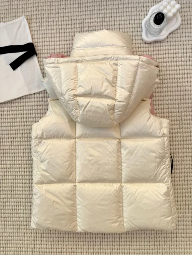 Moncler Vests Hooded quilted puffer vest with contrast shoulder panels product detail image 2