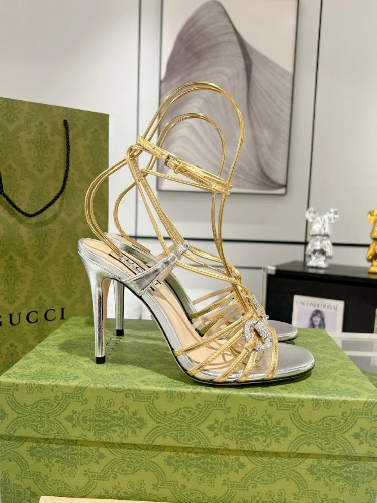 Gucci High Heels Strappy ankle-wrap stiletto sandals with crystal G detail — Golden
