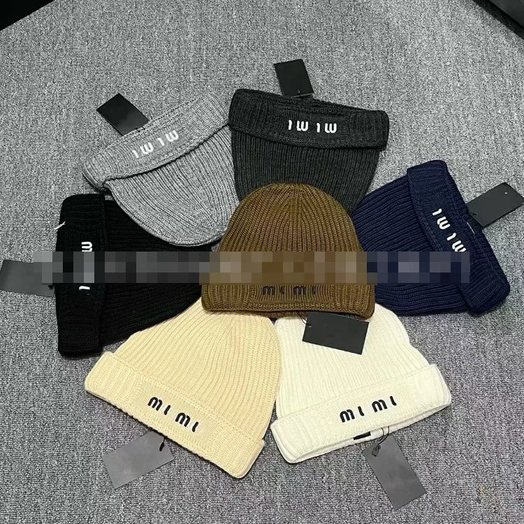 Miu Miu letter-embroidered ear-warming knitted hat