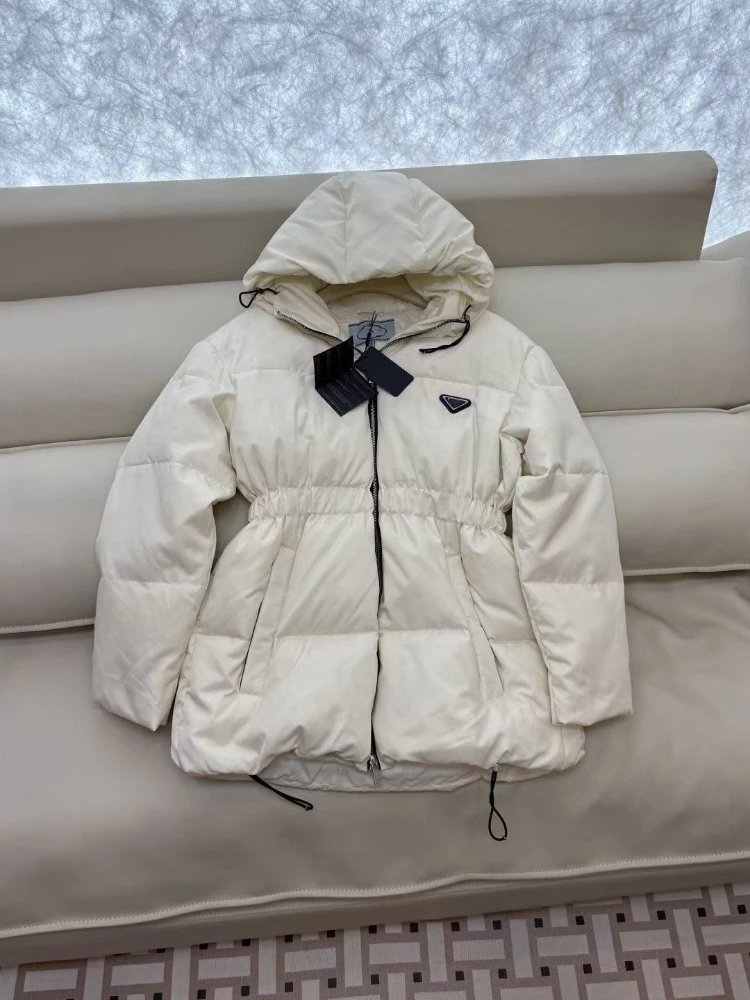 Prada Down Jackets Hooded quilted puffer jacket with elastic waist and drawstring hem — Off-white