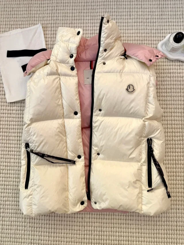 Moncler Vests Hooded quilted puffer vest with contrast shoulder panels product detail image 3