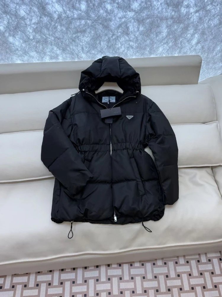 Prada Down Jackets Hooded quilted puffer jacket with elastic waist and drawstring hem — Black
