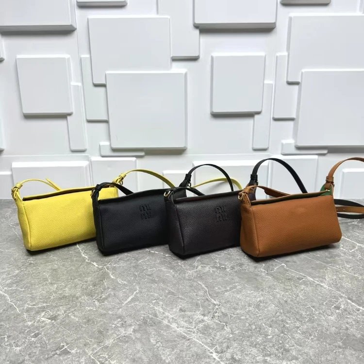 Miu Miu embossed logo leather pouch bag