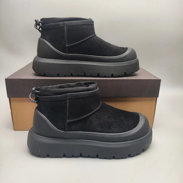 UGG Boots Suede ankle snow with platform lug soles — 4196 black background