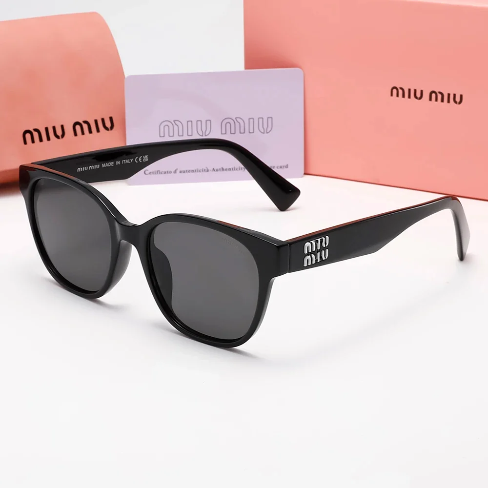 Miu Miu Classic Cat-Eye Round Frame Glasses
