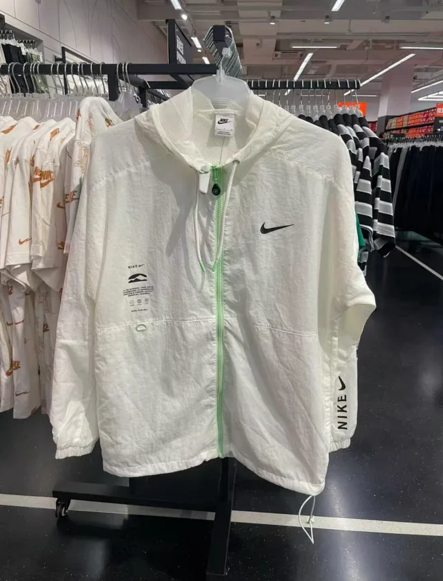 Nike Jackets Lightweight Hooded Windbreaker with Rainbow Graphic product detail image 1