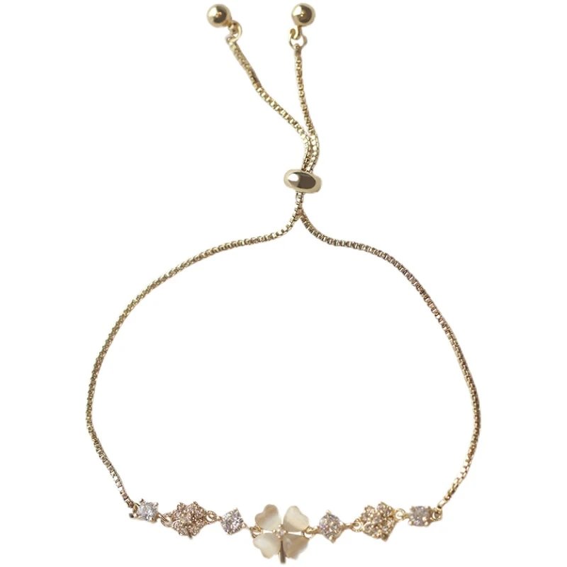 Gold Tone Floral Charm White Shell Adjustable Bracelet