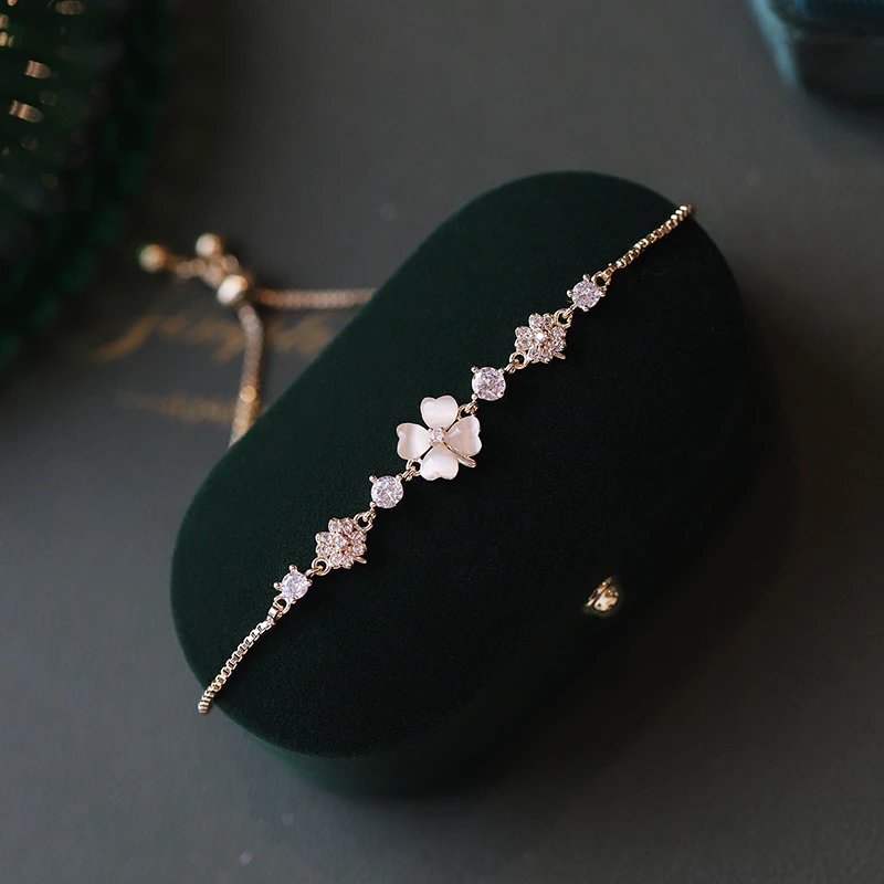 Gold Tone Floral Charm White Shell Adjustable Bracelet
