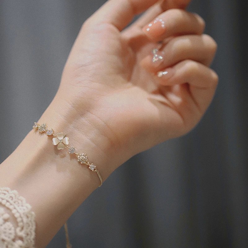 Gold Tone Floral Charm White Shell Adjustable Bracelet
