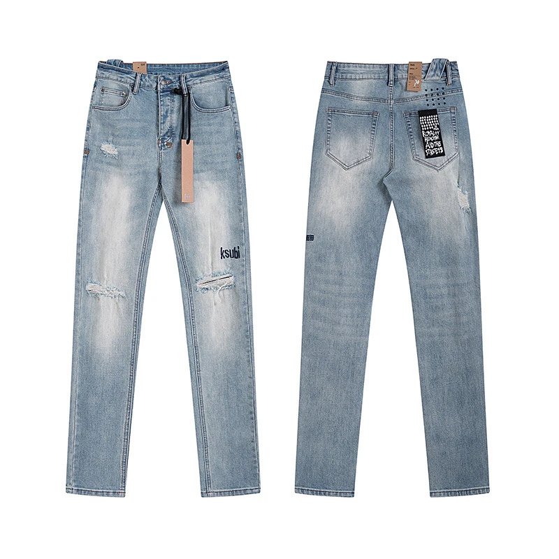 Distressed Gray Denim Jeans With Graffiti Print And Ripped Details