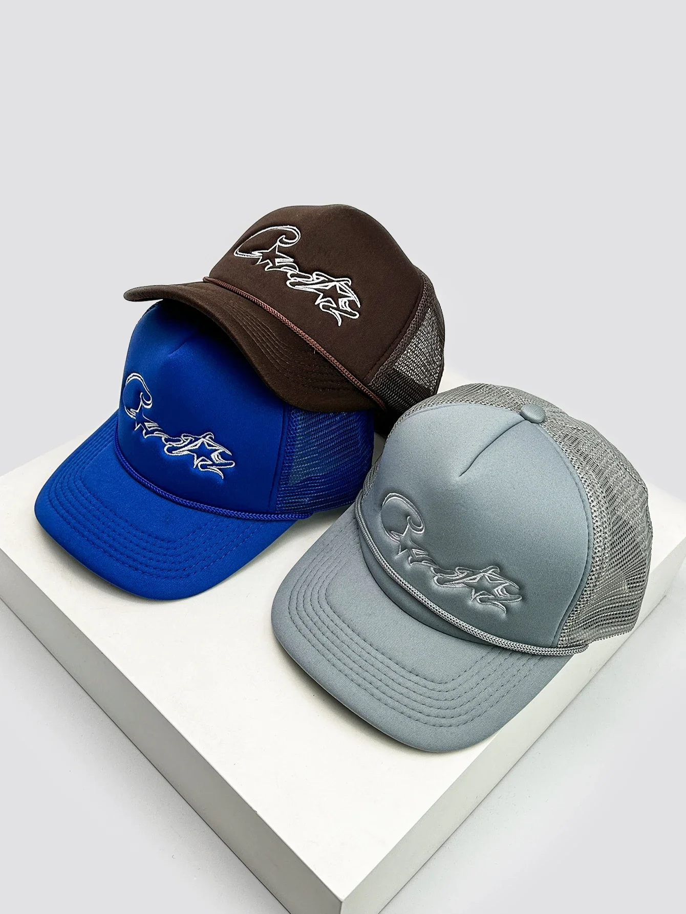 Trucker Hats with Embroidered Wave Design in Blue, Brown, and Grey