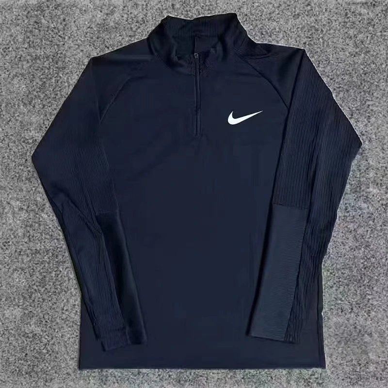 Nike Jackets Trail hooded lightweight full-zip jacket — Black ribbed half-zip long-sleeve