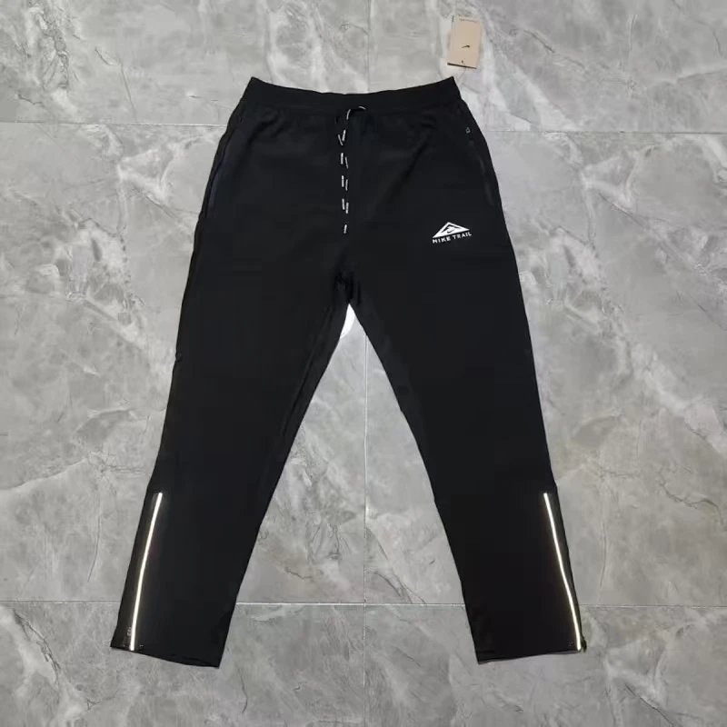 Nike Jackets Trail hooded lightweight full-zip jacket — Hot black trousers 01