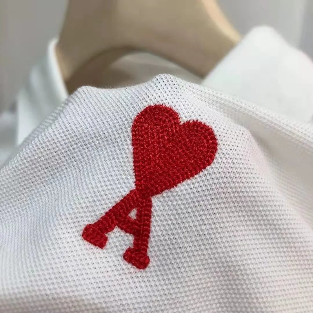 AMI Paris Heart Embroidered Polo Shirt photo 7