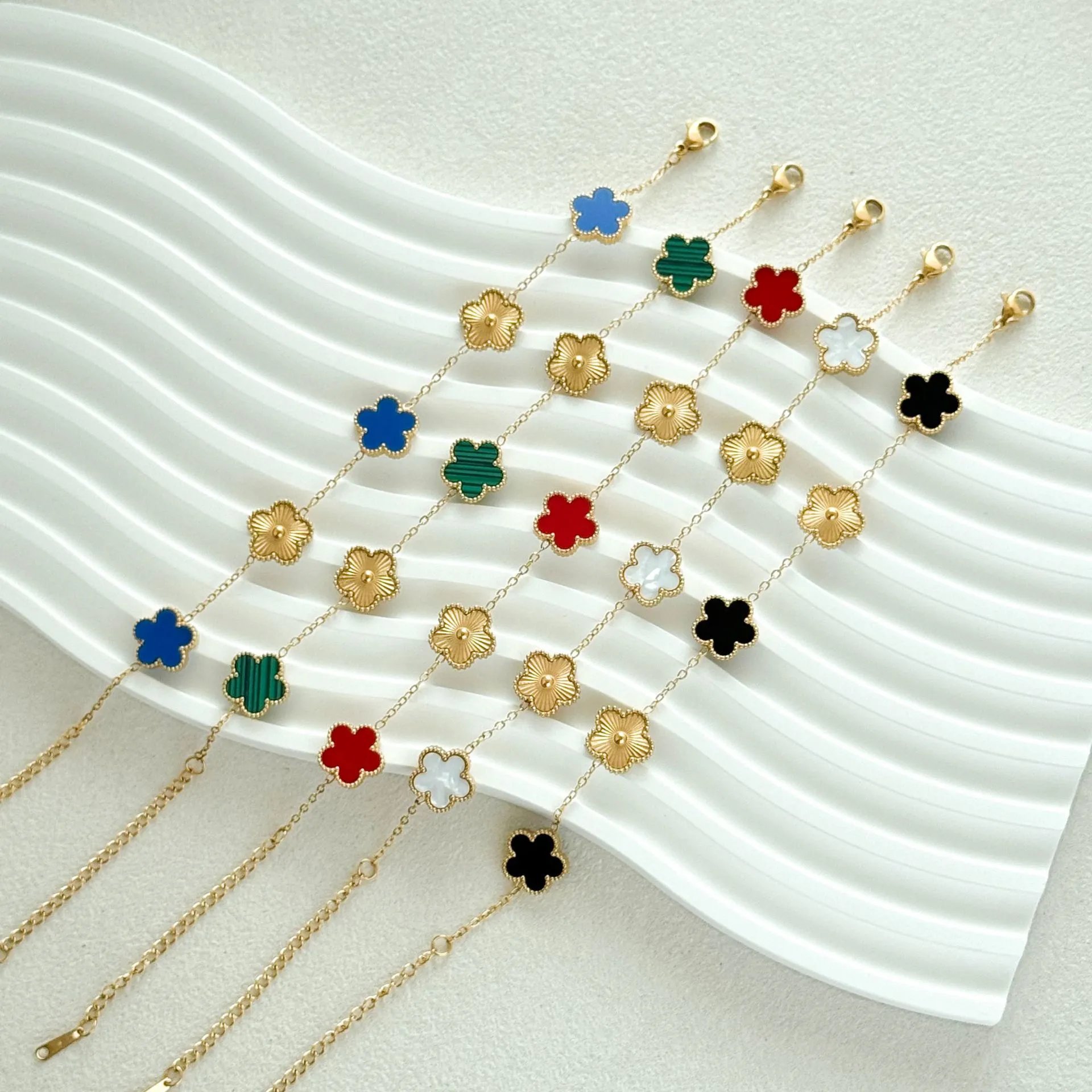 Van Cleef & Arpels Gold Clover Charm Bracelets