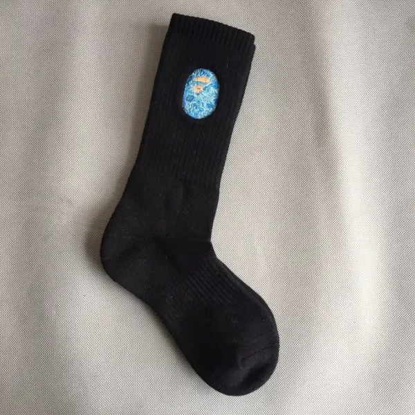 Design Embroidered Ocean Face Sock Black - 1