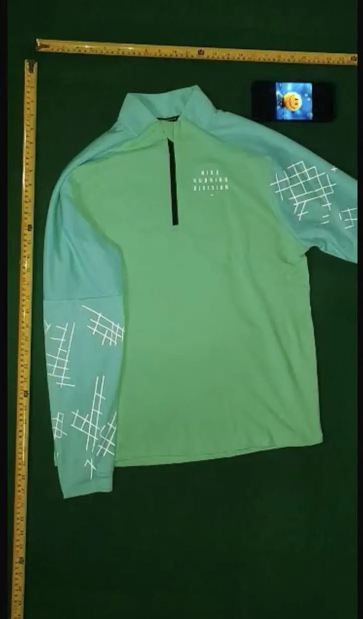 1: 1. Green grid clothing