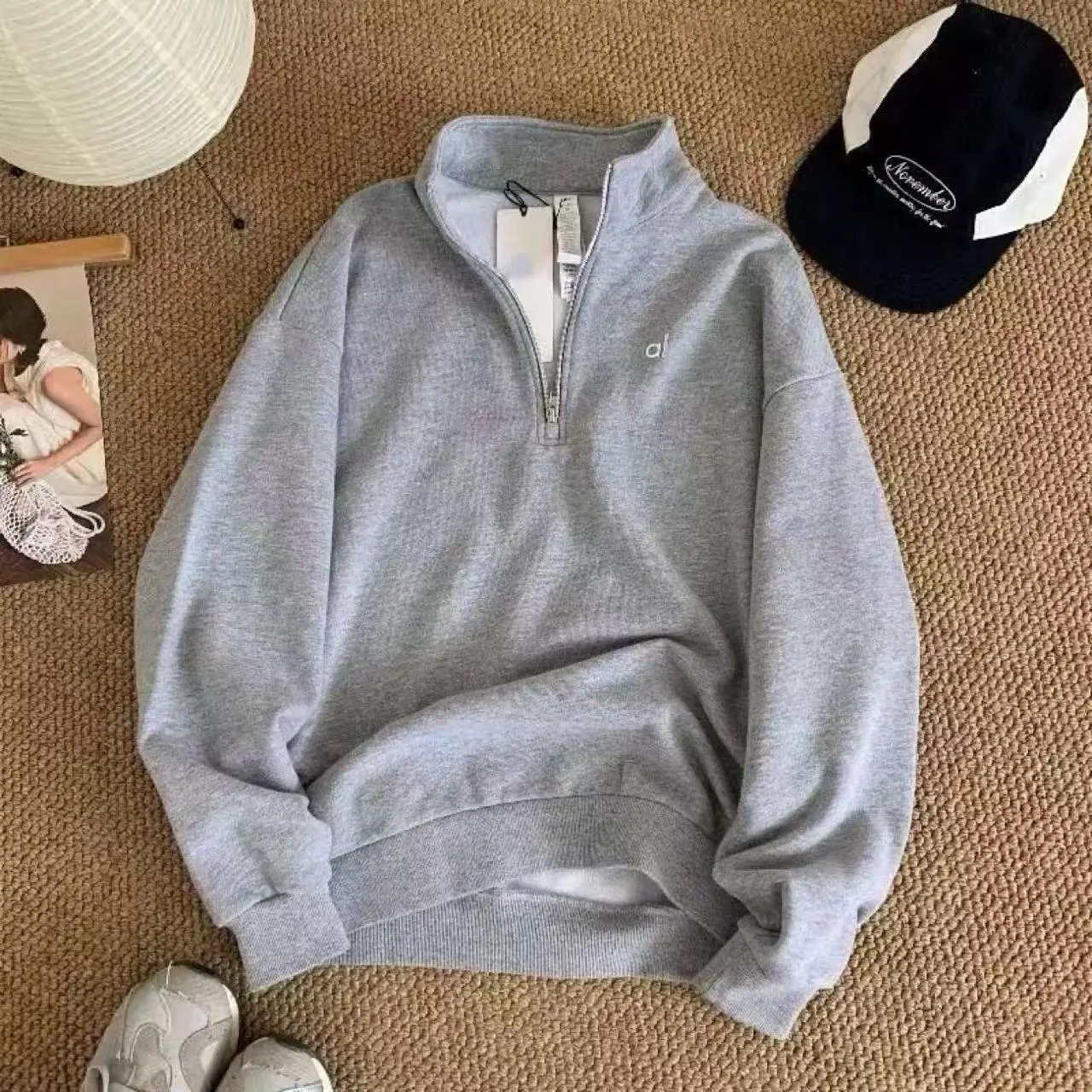 Alo Yoga Hoodies & Sweatshirts Zip-Up Hooded Sweatshirt — Gray half-zip top