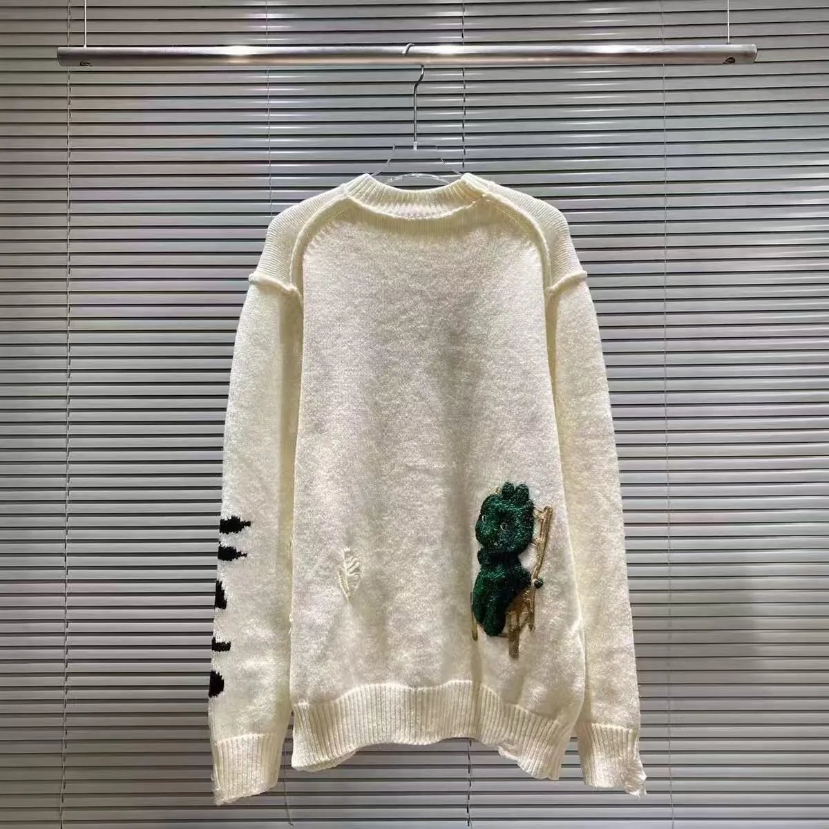 Balenciaga Knitwear Logo-print crewneck sweater — J-12