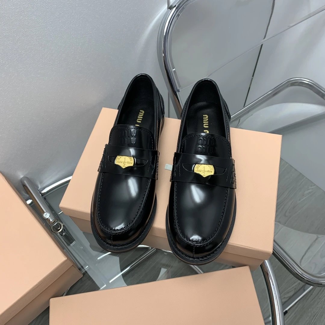 Miu Miu Logo Penny Loafers