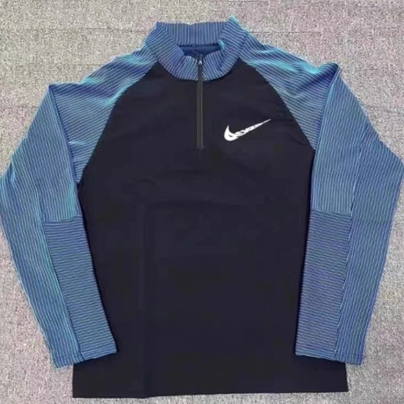 Nike Trousers Tapered athletic track pants — Blue threaded half-zip long-sleeve