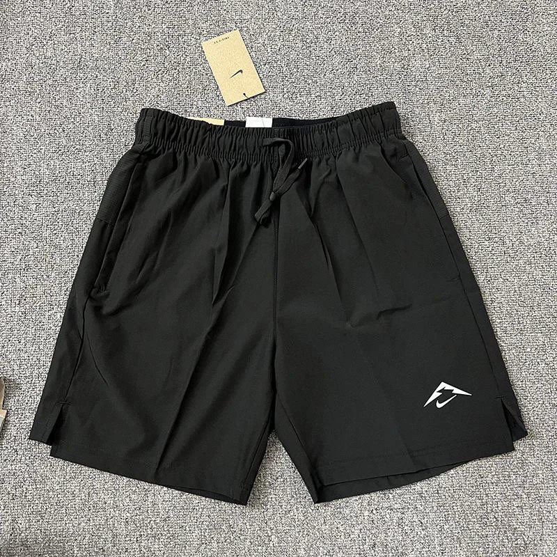 Nike Trousers Tapered athletic track pants — Black athletic shorts