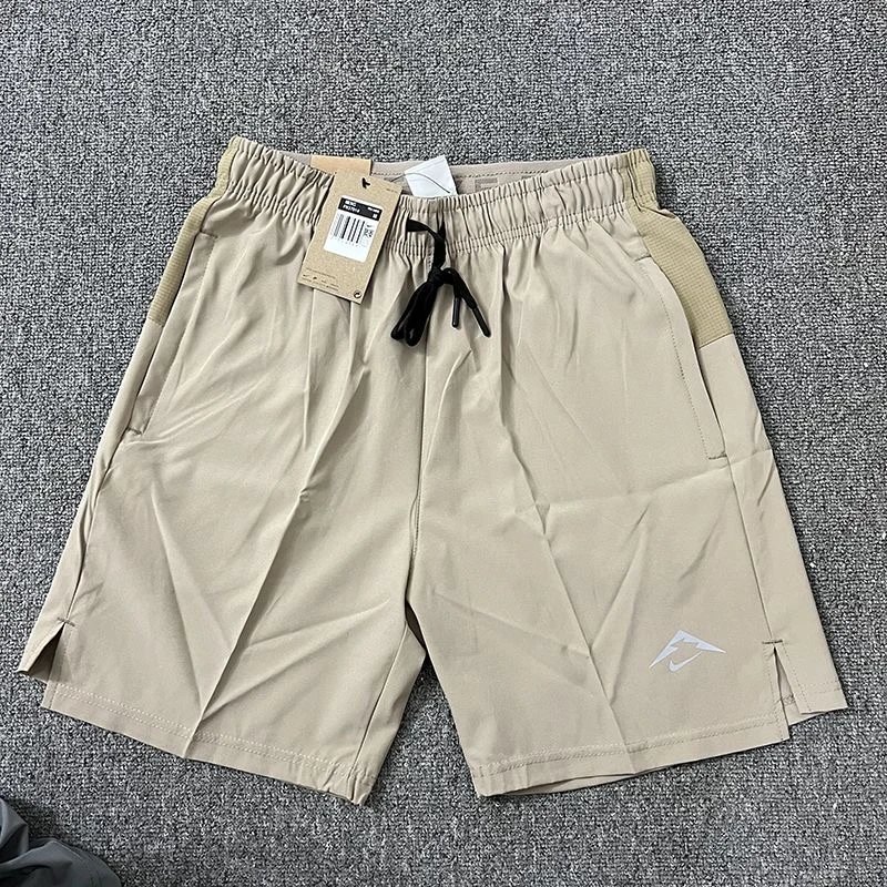 Nike Trousers Tapered athletic track pants — Sports Shorts 03