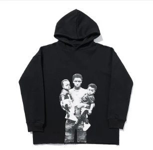 The father carries the child.