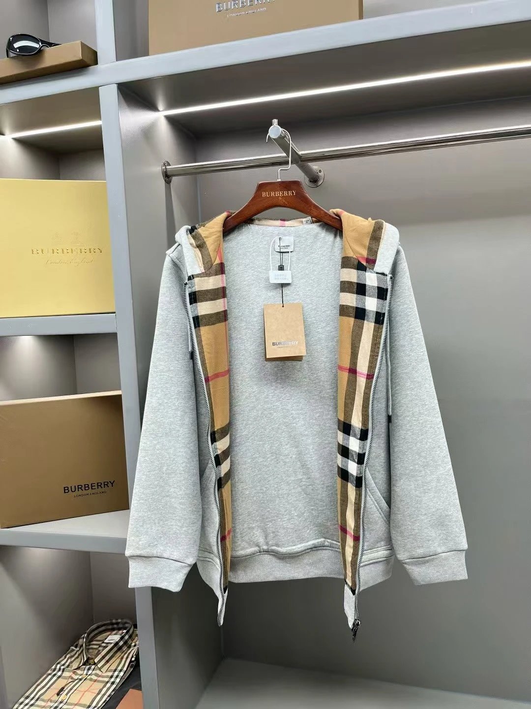 B's gray cardigan