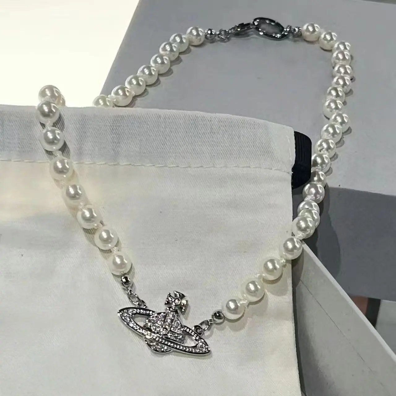 Vivienne Westwood Jewelry Crystal Orb Safety Pin Necklace — 31