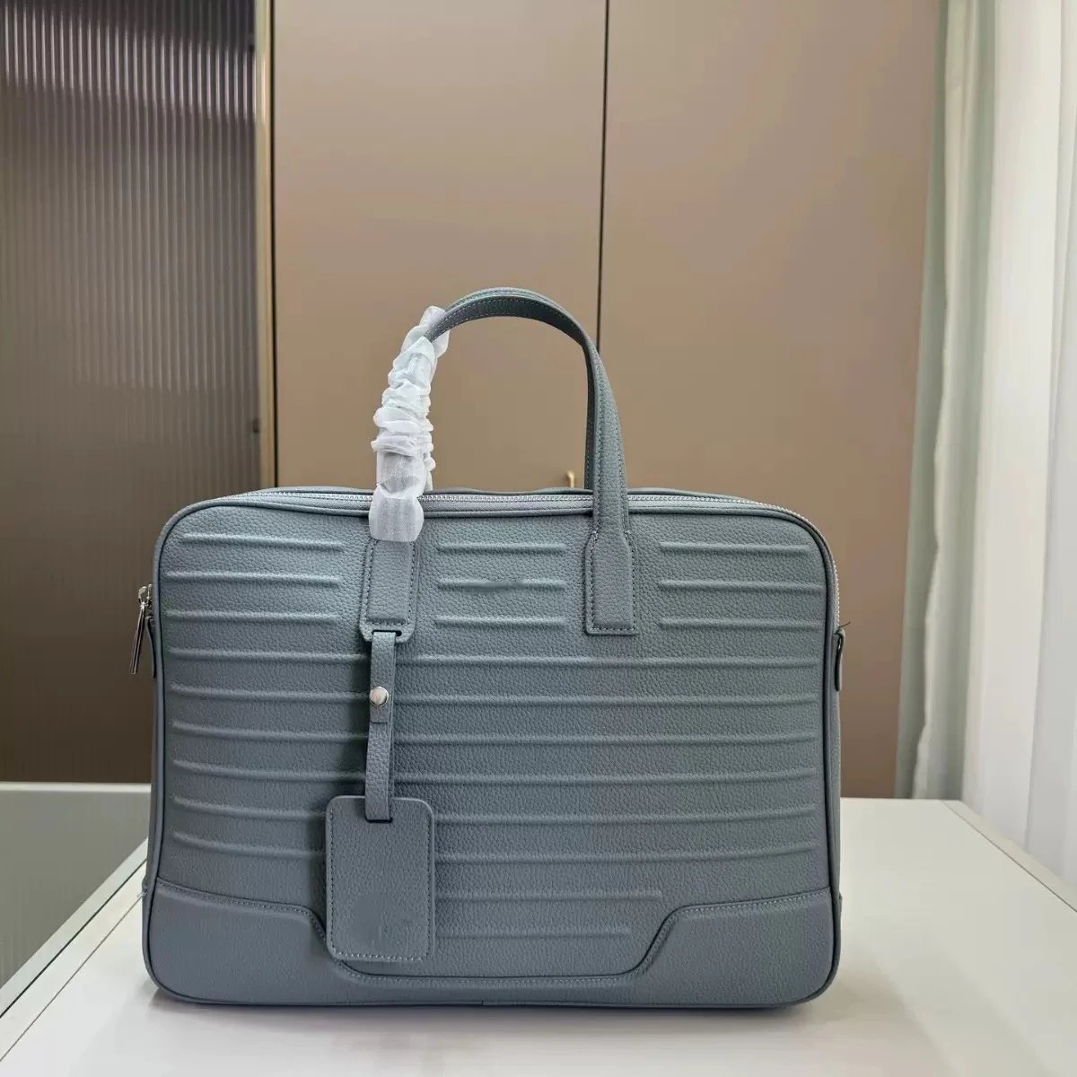 RIMOWA Travel Bags Ribbed hard-shell spinner luggage — gray
