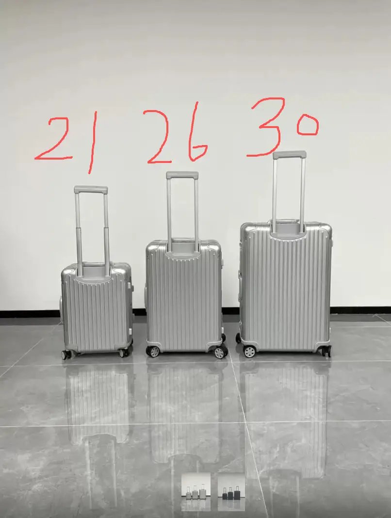 RIMOWA Travel Bags Ribbed hard-shell spinner luggage — Silver 21-inch