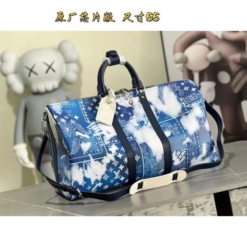 Louis Vuitton Travel Bags Monogram duffel bag with shoulder strap — 25