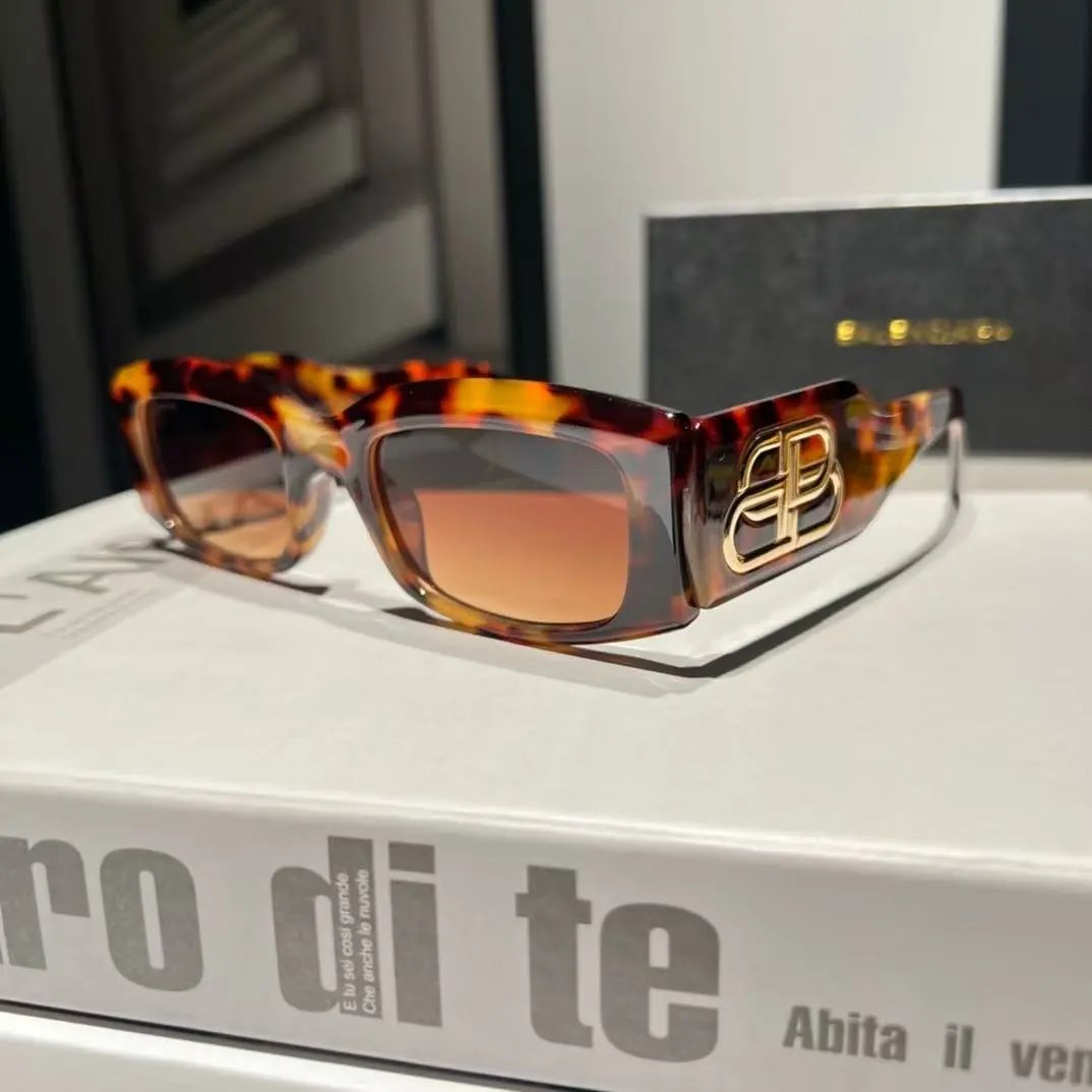 Balenciaga Eyewear Rectangular Logo Sunglasses — 37