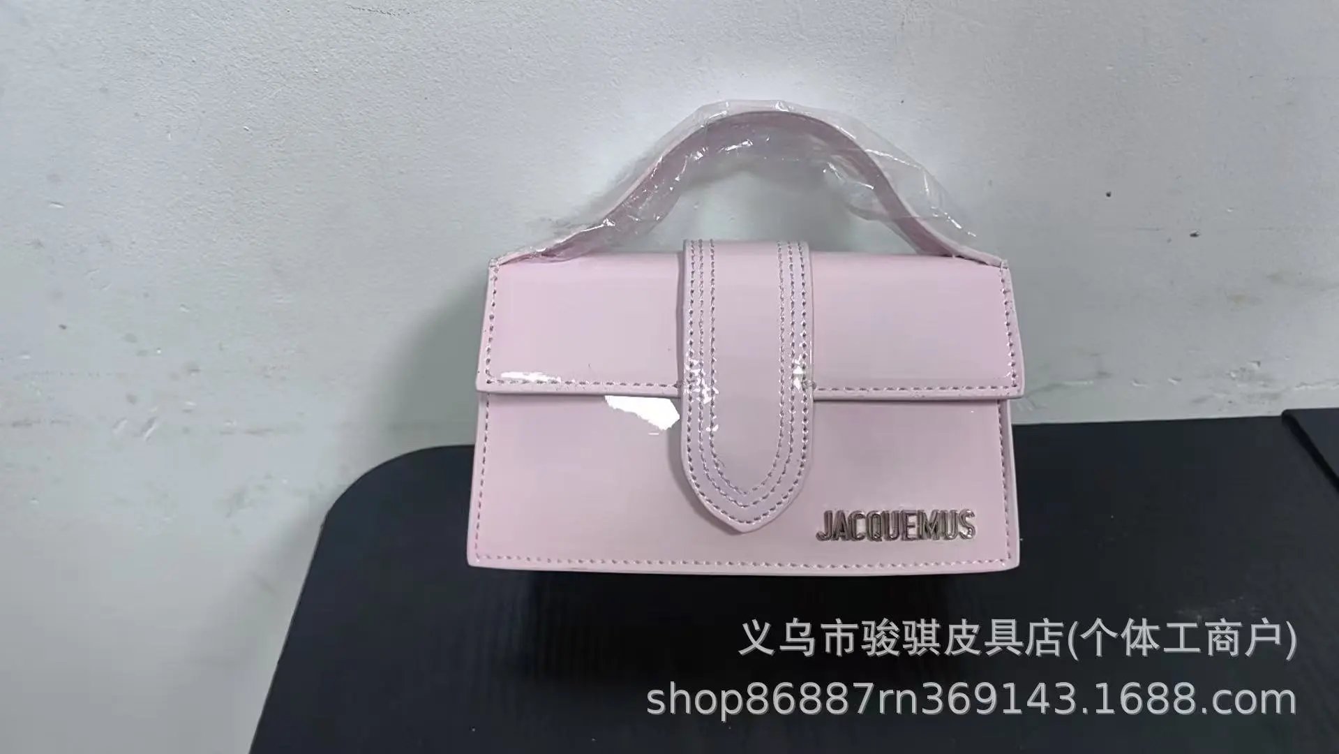 Jacquemus Handbags Structured flap handbag with top handles and detachable shoulder strap — 24(18cm)