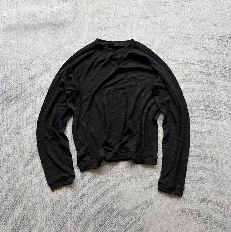 Hollow Bamboo Knot Long Sleeve Top in Black