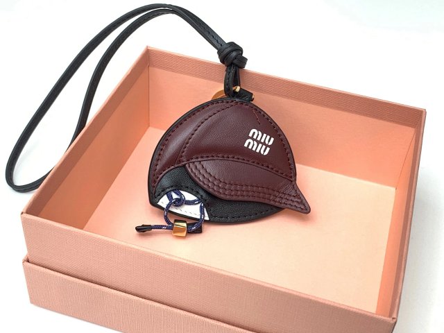 Miu Miu Miu Miu Burgundy Leather Baseball Cap Bag Charm - Buy on Kakobuysheetfind