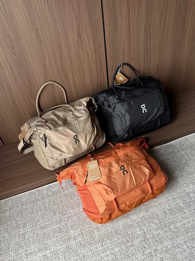 On Running On Running Orange Waterproof Nylon Travel Bag - Buy on Kakobuysheetfind