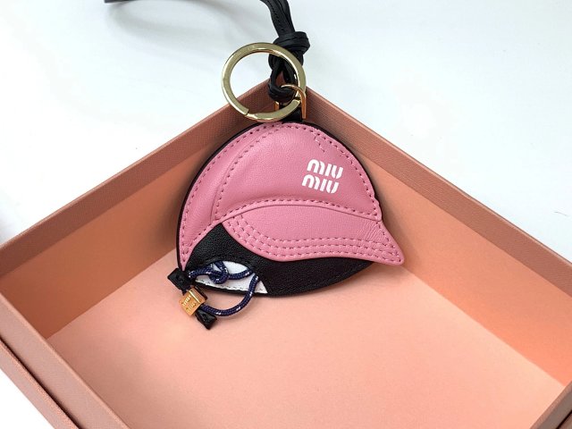 Miu Miu Miu Miu Pink Black Leather Cap Keychain - Buy on Kakobuysheetfind