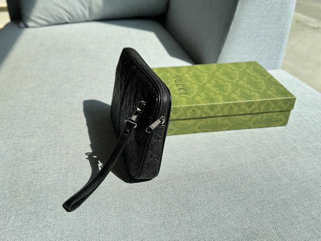 Gucci Gucci Black GG Leather Embossed Clutch Bag - Buy on Kakobuysheetfind