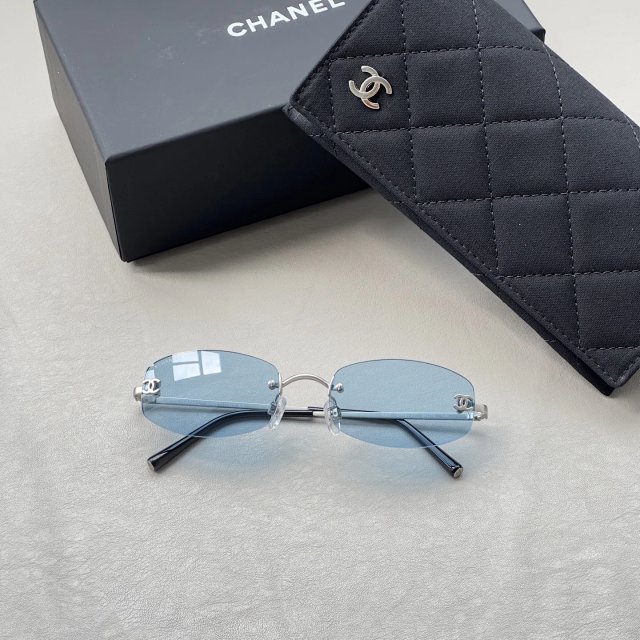 Chanel Chanel Light Blue Rimless Metal Frame Sunglasses - Buy on Kakobuysheetfind